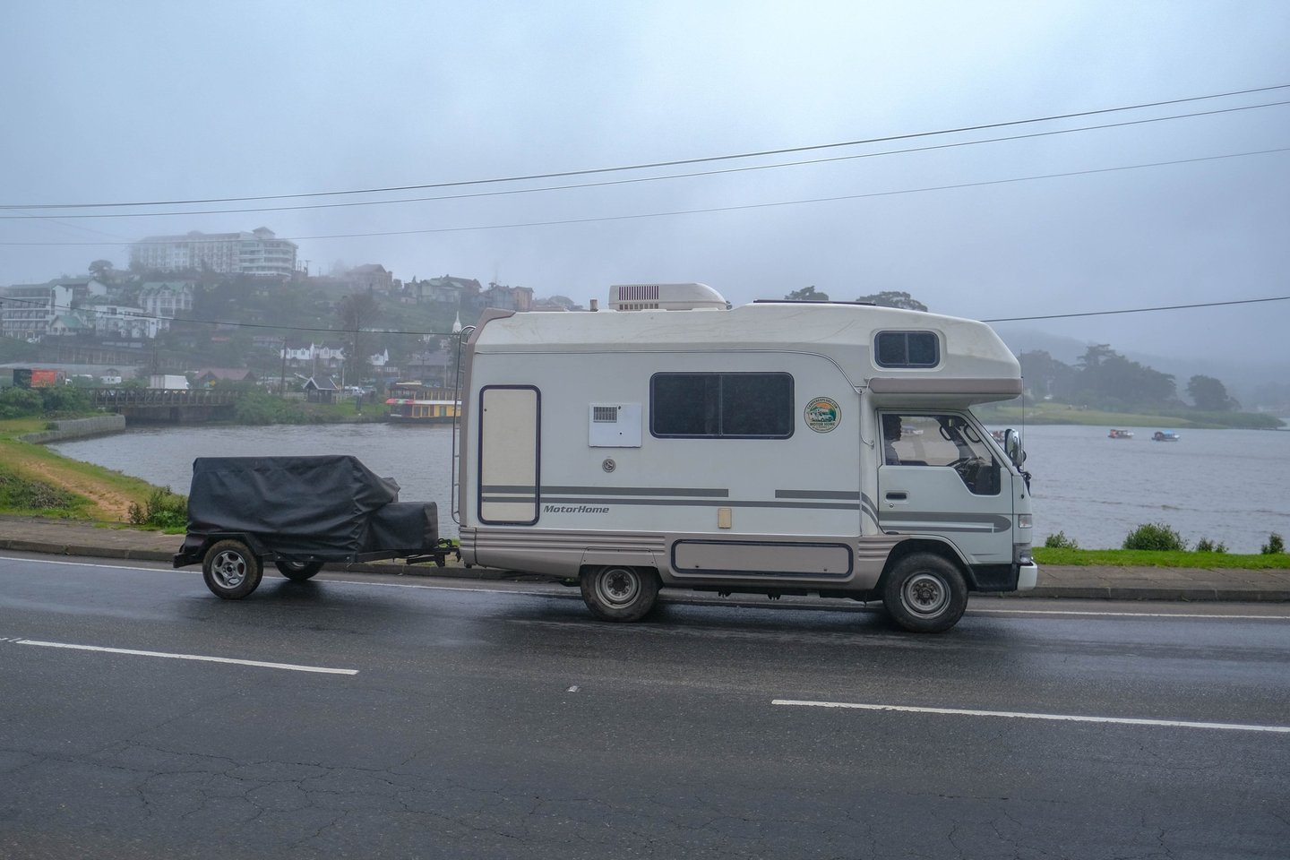 Our motorhome parked beside a lake in Sri Lanka's hill country